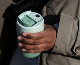 The flip-top cap opened to reveal the covered drinking mouthpiece.