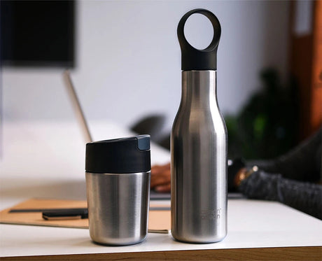 Joseph Joseph Sipp 340ml travel mug and Loop 500ml bottle side by side