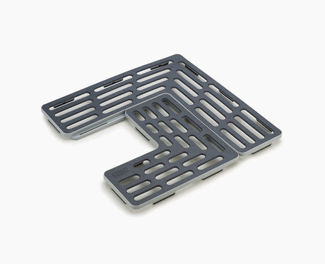 Joseph Joseph Sink Saver adjustable sink mat in grey, seen from above.