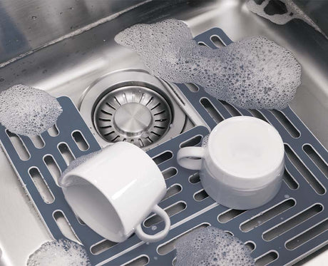 The mat adjusted to a different width to fit a narrower sink.