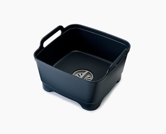 Joseph Joseph Wash&Drain washing-up bowl in grey, seen from above.