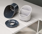 The drainer taken apart into its separate pieces for cleaning.