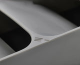 A hand lifting a fork from the top tier of the grey cutlery organiser.