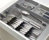 Overhead view showing the tiered cutlery section beside the long utensil channel.