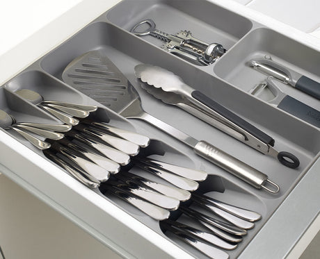 Overhead view showing the tiered cutlery section beside the long utensil channel.