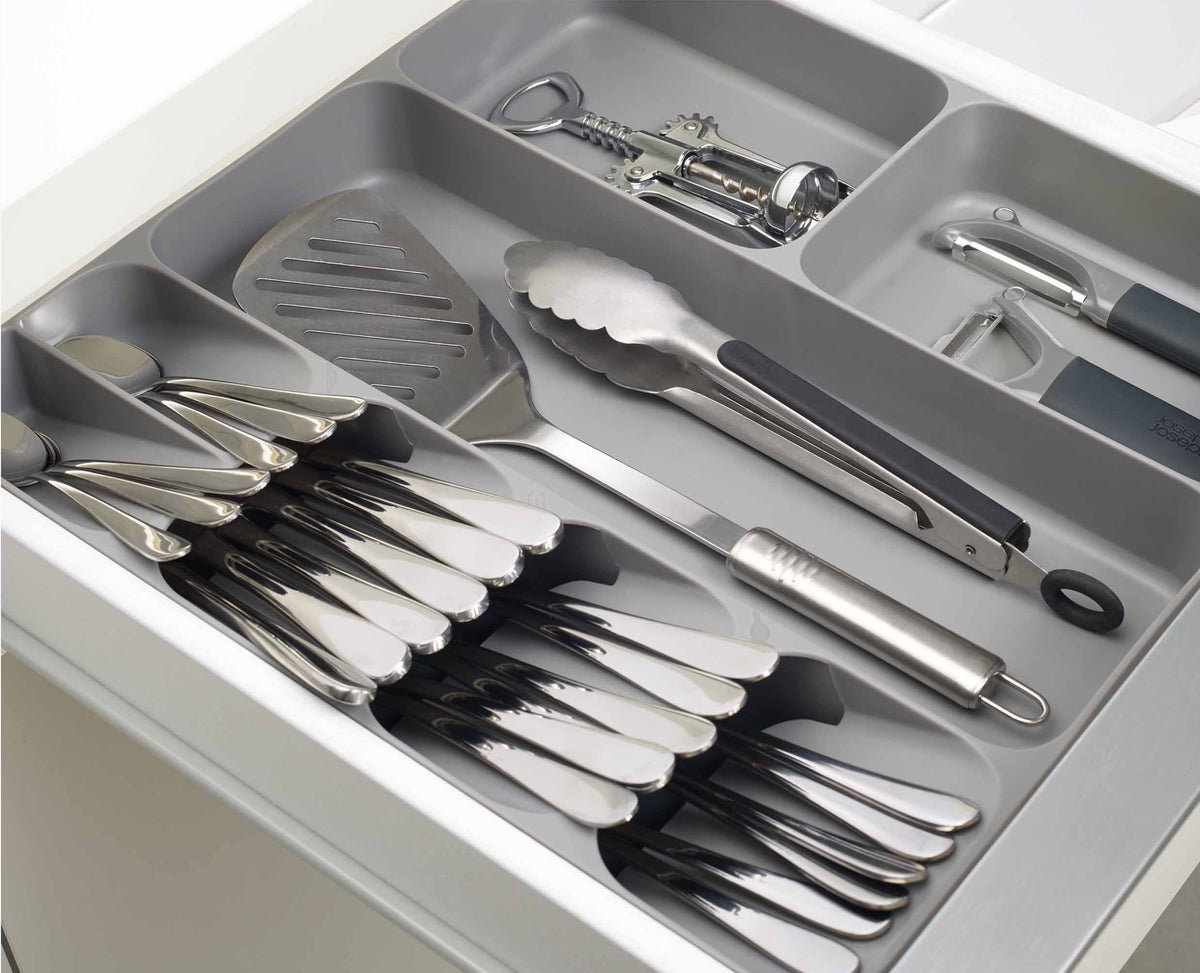 The twin gadget compartments holding bulkier kitchen tools such as a tin opener.