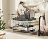 Joseph Joseph Excel 2-tier dish rack loaded with plates and glasses