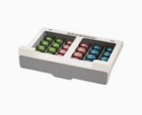 Joseph Joseph CupboardStore under-shelf coffee pod drawer in grey, filled with coffee pods.