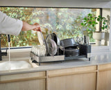 Joseph Joseph Extend Max stainless steel expandable dish rack draining spout positioned over the sink, Homelux Kenya