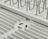 Joseph Joseph Extend Steel dish rack chopping board rail in use