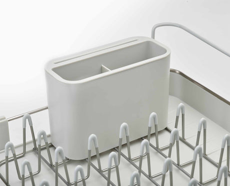 Joseph Joseph Extend Steel dish rack in stone in a kitchen setting