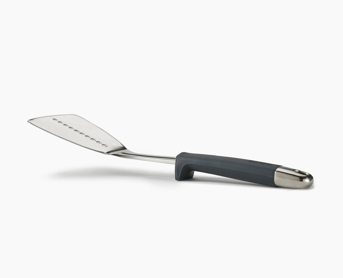 Joseph Joseph Elevate Steel slotted spoon, turner, spaghetti claw, solid spoon, ladle and skimmer laid out