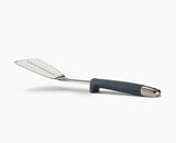 Joseph Joseph Elevate Steel slotted spoon, turner, spaghetti claw, solid spoon, ladle and skimmer laid out