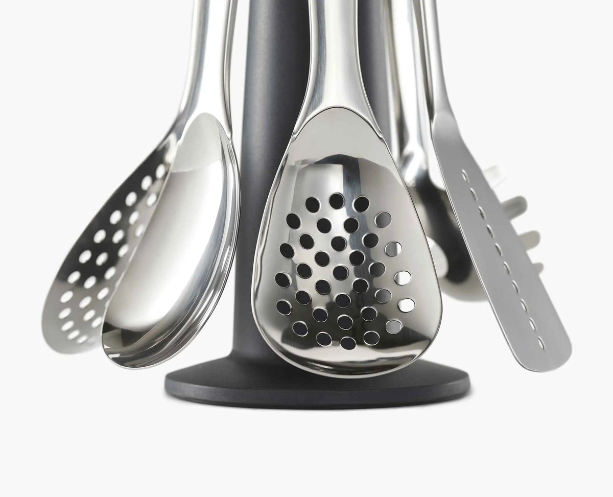 Joseph Joseph Elevate Steel ladle in use over a pan