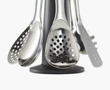 Joseph Joseph Elevate Steel ladle in use over a pan