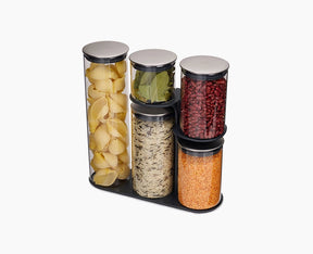 Joseph Joseph Podium set of five glass storage containers with steel lids on their stand.