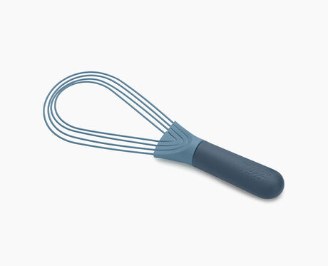 Joseph Joseph Twist 2-in-1 whisk in blue, set in its balloon whisk shape.