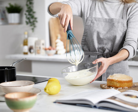 The same whisk twisted into its flat profile for blending sauces.