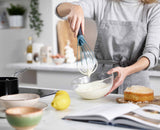 Close-up of the handle mechanism that switches between the two whisk shapes.