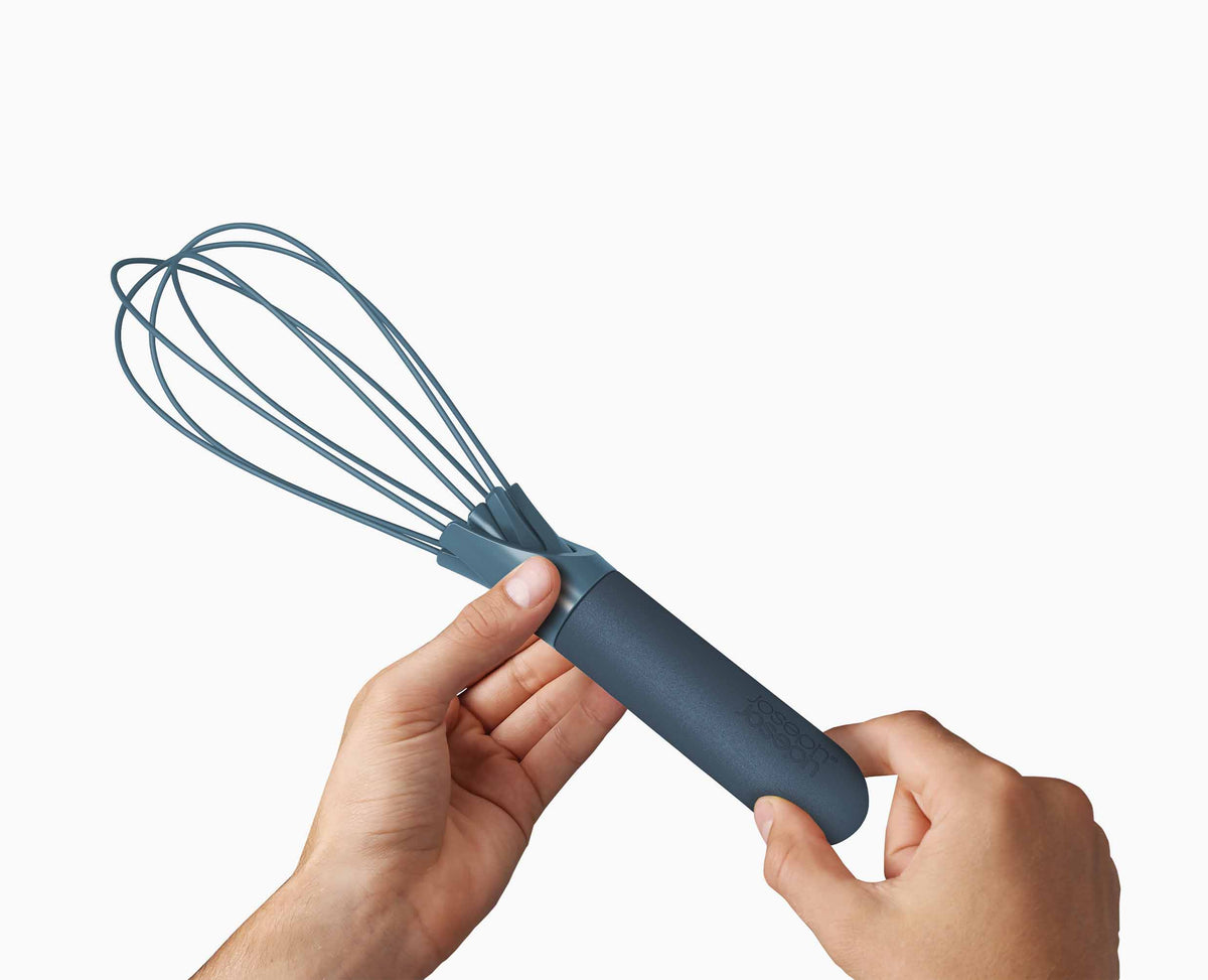The whisk folded flat, showing how little drawer space it takes.