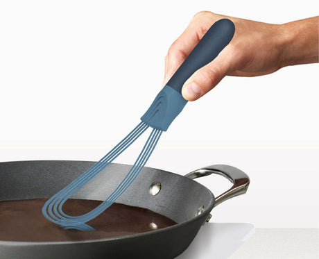 The silicone-coated wires being used in a non-stick pan on the hob.