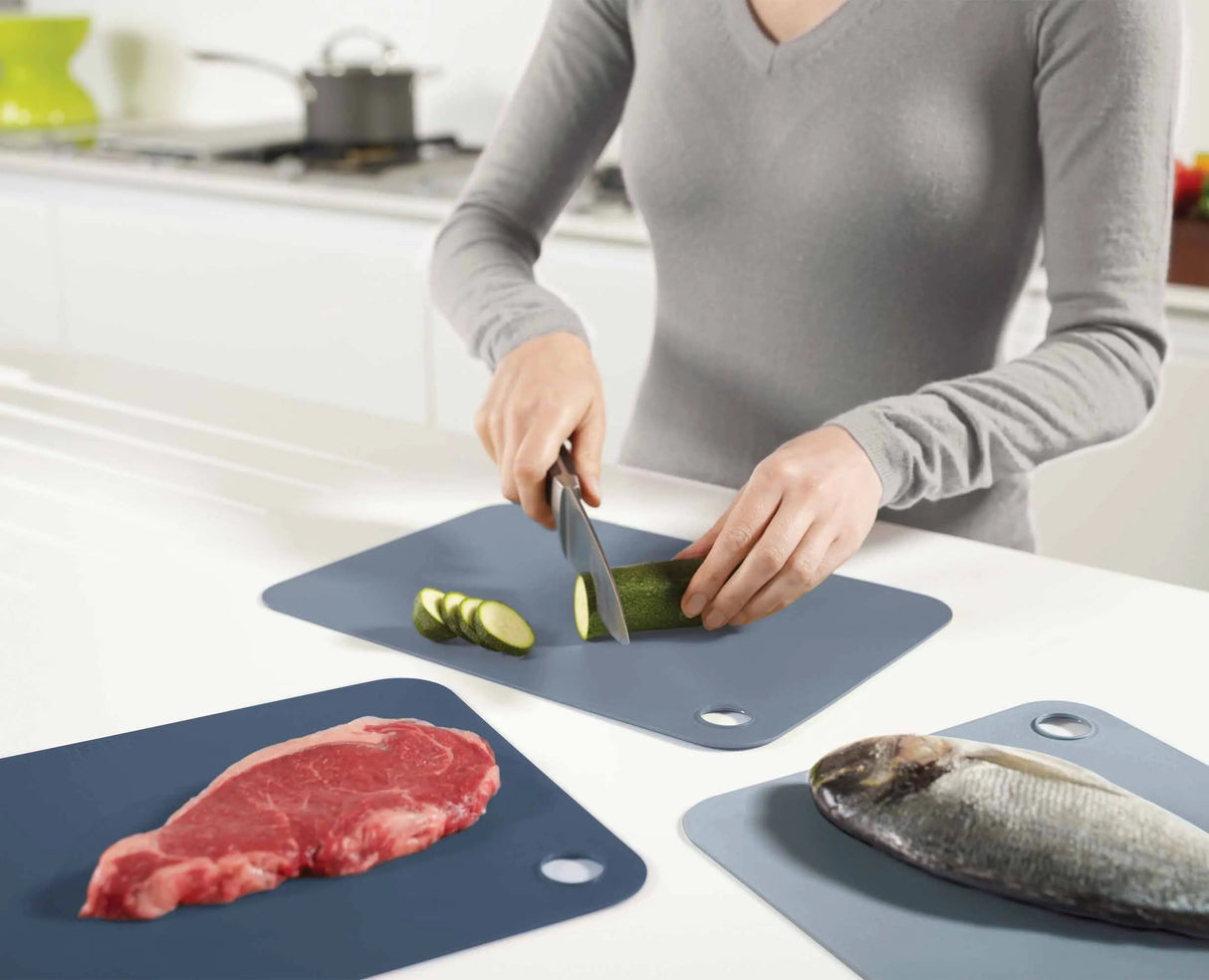 A mat bent into a chute to tip chopped vegetables straight into a pan.