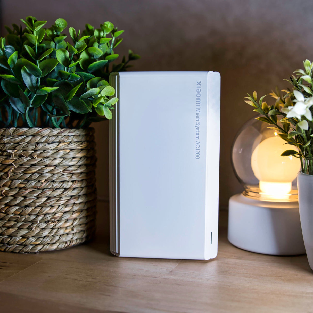 Xiaomi Mesh System AC1200 router set up in a home living room