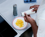 Joseph Joseph Milltop mill grinding pepper over a plate, Homelux Kenya