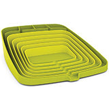 Joseph Joseph Arena self-draining dish rack in green, 43.7cm wide.
