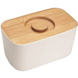 Joseph Joseph white melamine bread bin with beech wood lid, shown closed.