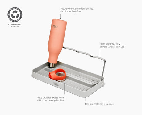 Joseph Joseph DrySmart folding bottle drying rack in stone on a kitchen counter beside the sink, Homelux Kenya