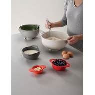 Close-up detail of the strainer from the Joseph Joseph Duo 6-Piece Food Preparation Bowl Set.