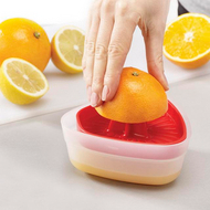 Red Joseph Joseph Duo manual citrus juicer, third product image