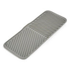 Joseph Joseph Duo foldable draining mat in grey, laid out flat.
