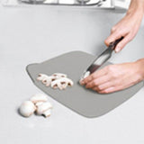 Grey Joseph Joseph Duo folding chopping board measuring 32.5 by 26 cm, second product image