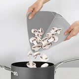 Folding action of the grey Joseph Joseph Duo chopping board, third product image