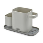 Joseph Joseph Duo Sink Tidy in dark grey, shown from the front.