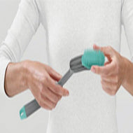 Joseph Joseph Duo washing-up brush with quick-drying stiff bristles.