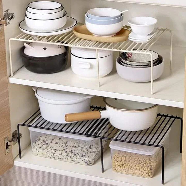 Expandable shelf raiser