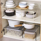 Expandable shelf raiser