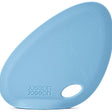 Joseph Joseph Fin silicone bowl scraper in blue, a curved self-standing spatula.