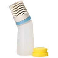 Joseph Joseph Glaze refillable silicone pastry brush in Stone with two interchangeable heads.