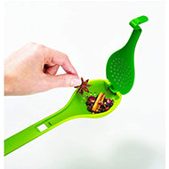 Green Joseph Joseph Gusto infusing spoon for herbs and spices, second product view.