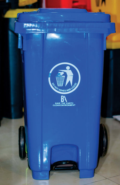 Blue 120L Bon Appetit wheelie bin in use indoors, showing pedal and wheels
