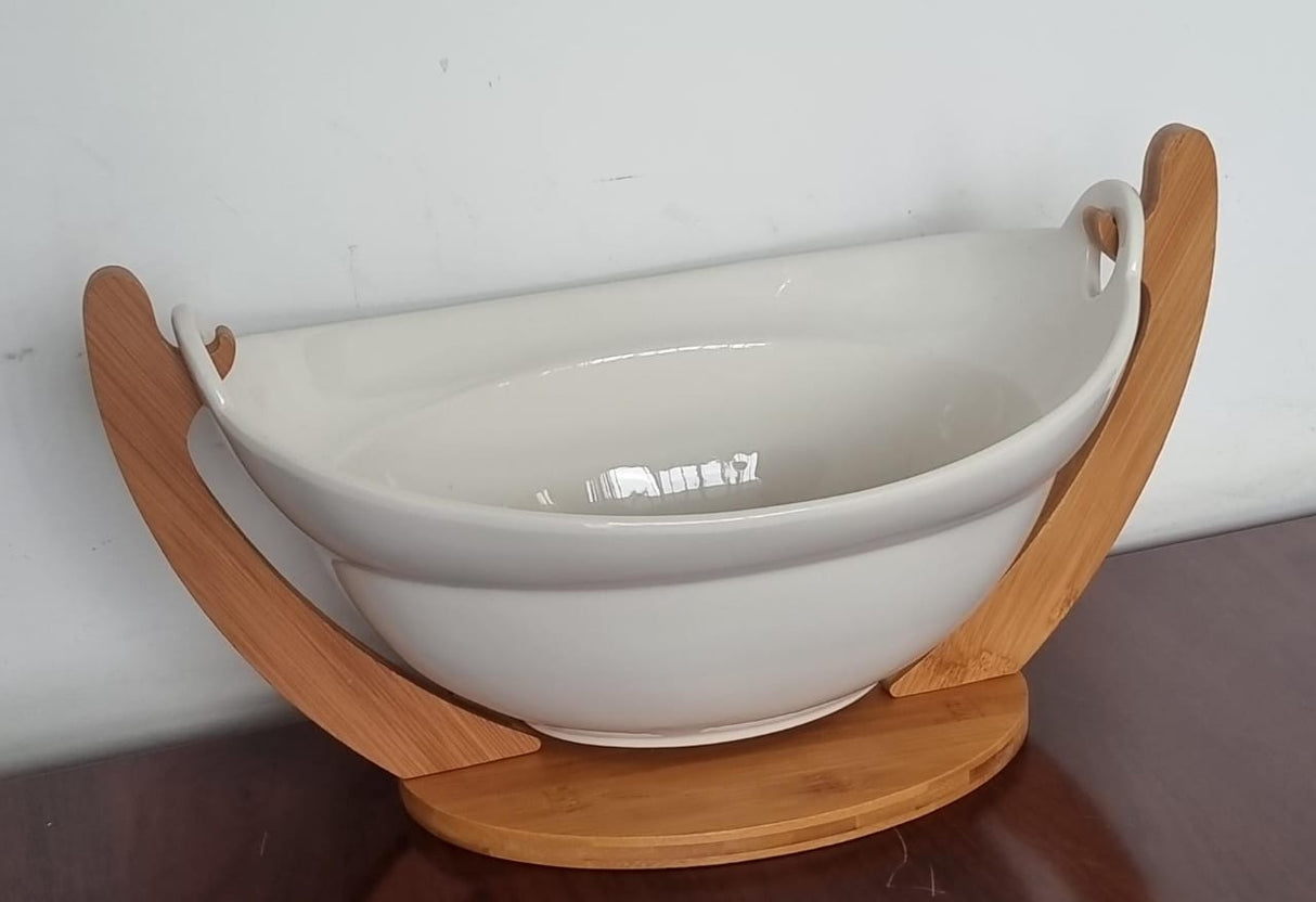 Ceramic fruit bowl on bamboo base