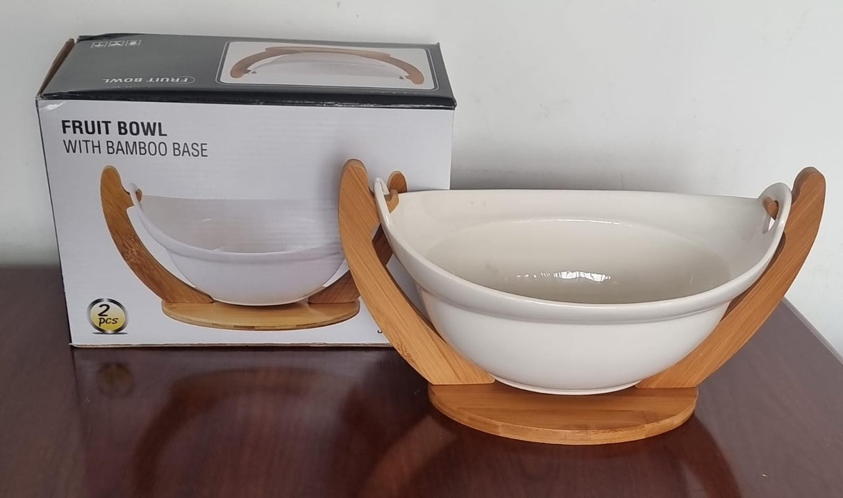 Ceramic fruit bowl on bamboo base
