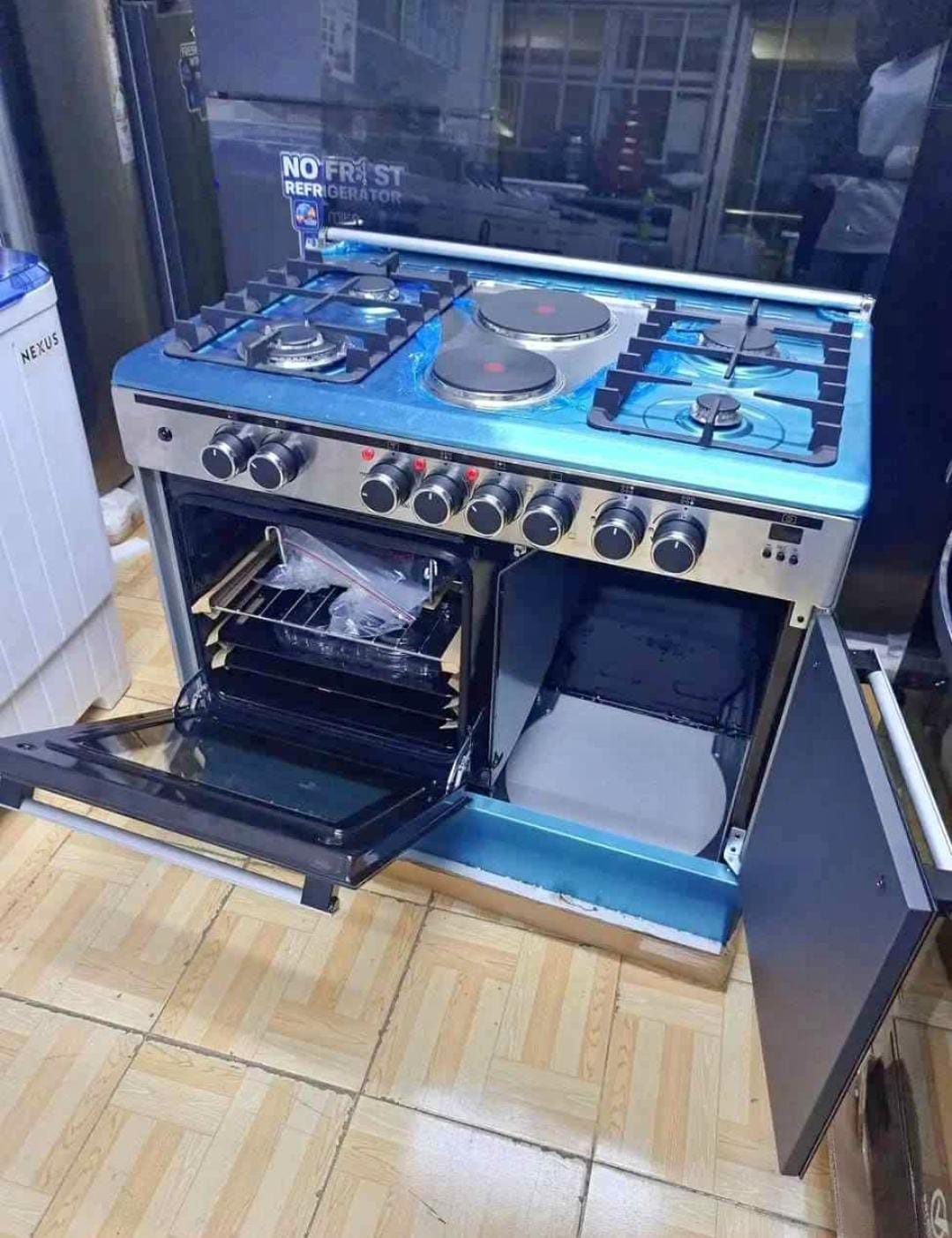 60*90 Haier 4+2 standing cooker with gas compartment and sensor.