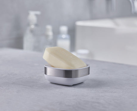 Side view of the soap dish showing the sloped, angled base that drains water away.