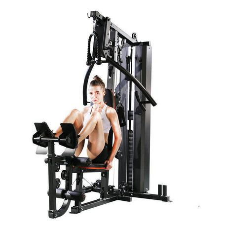 Athlete using the JX-916 multi-gym leg press station with its 72kg selectorised stack