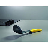 Joseph Joseph Elevate yellow ladle with its weighted handle.
